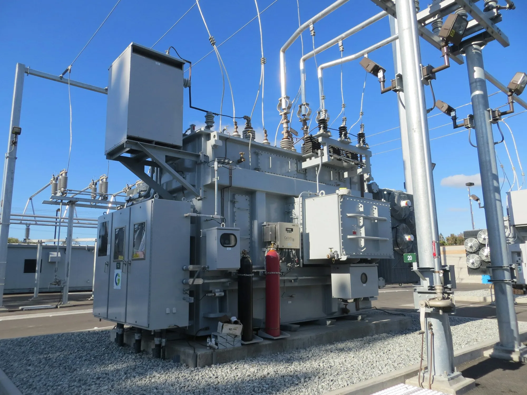 Power transformer in a substation on a clear day
